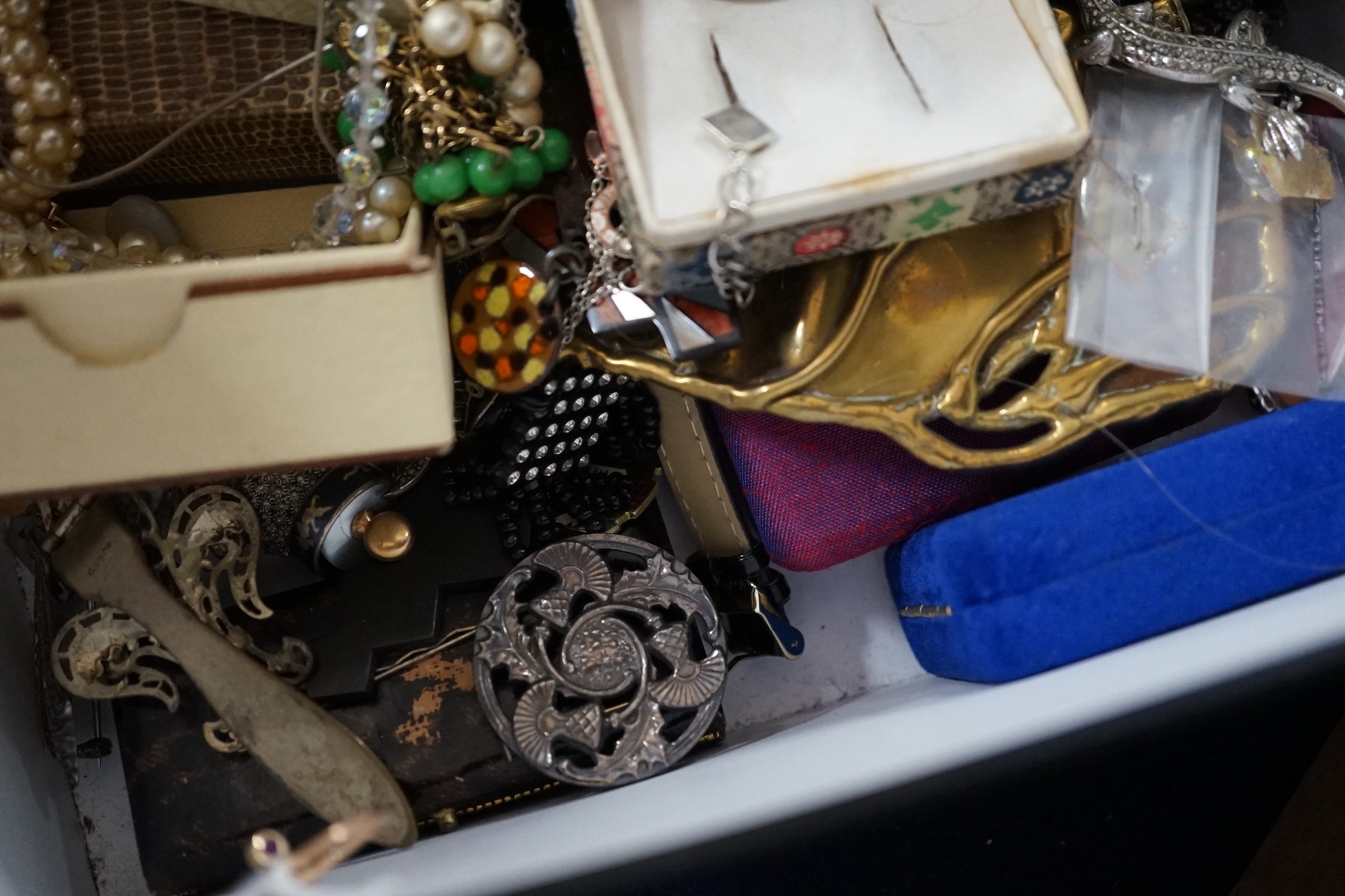 A yellow metal and gem set ring and a large quantity of assorted costume jewellery.